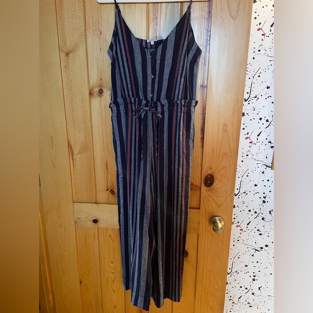 Striped vacation jumpsuit. The most versatile vacationing piece you can pack.